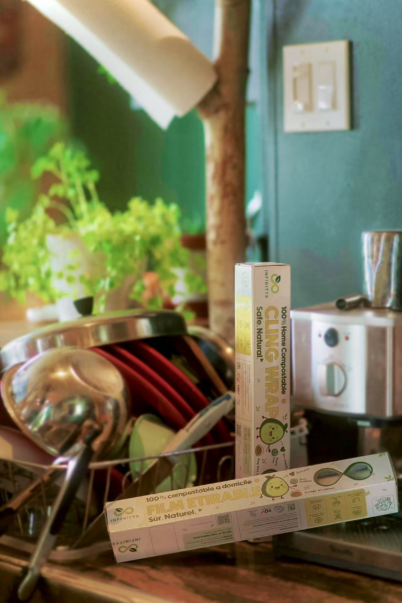 Two boxes of Infinity9 'Film Etirable' on a kitchen counter with a blurred background